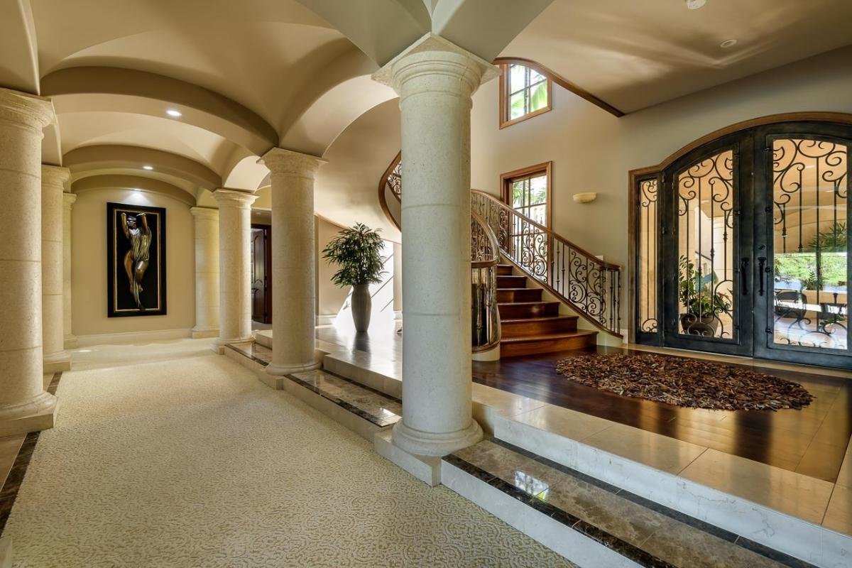 Foyer with a staircase.
