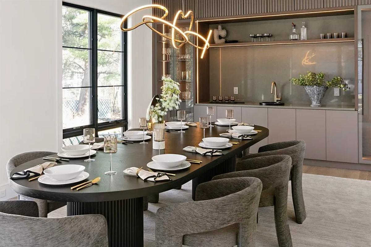 Dining room with a large table.