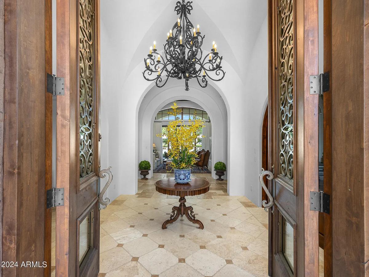 Foyer with a chandelier.