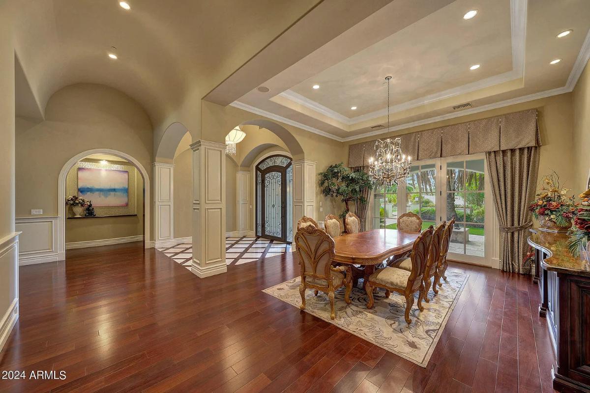 Dining room with a chandelier.