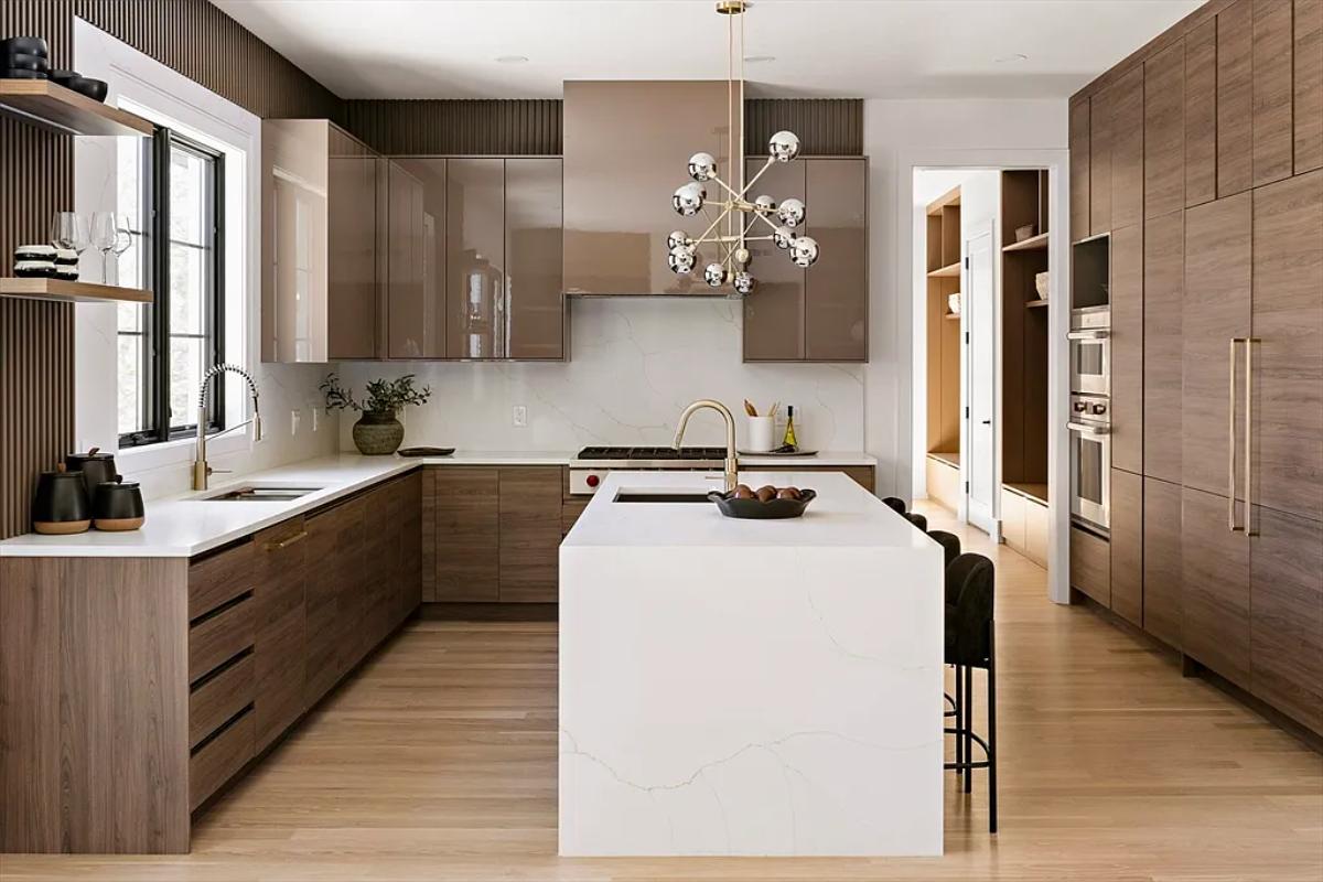 Kitchen with custom cabinetry and a counter breakfast bar.
