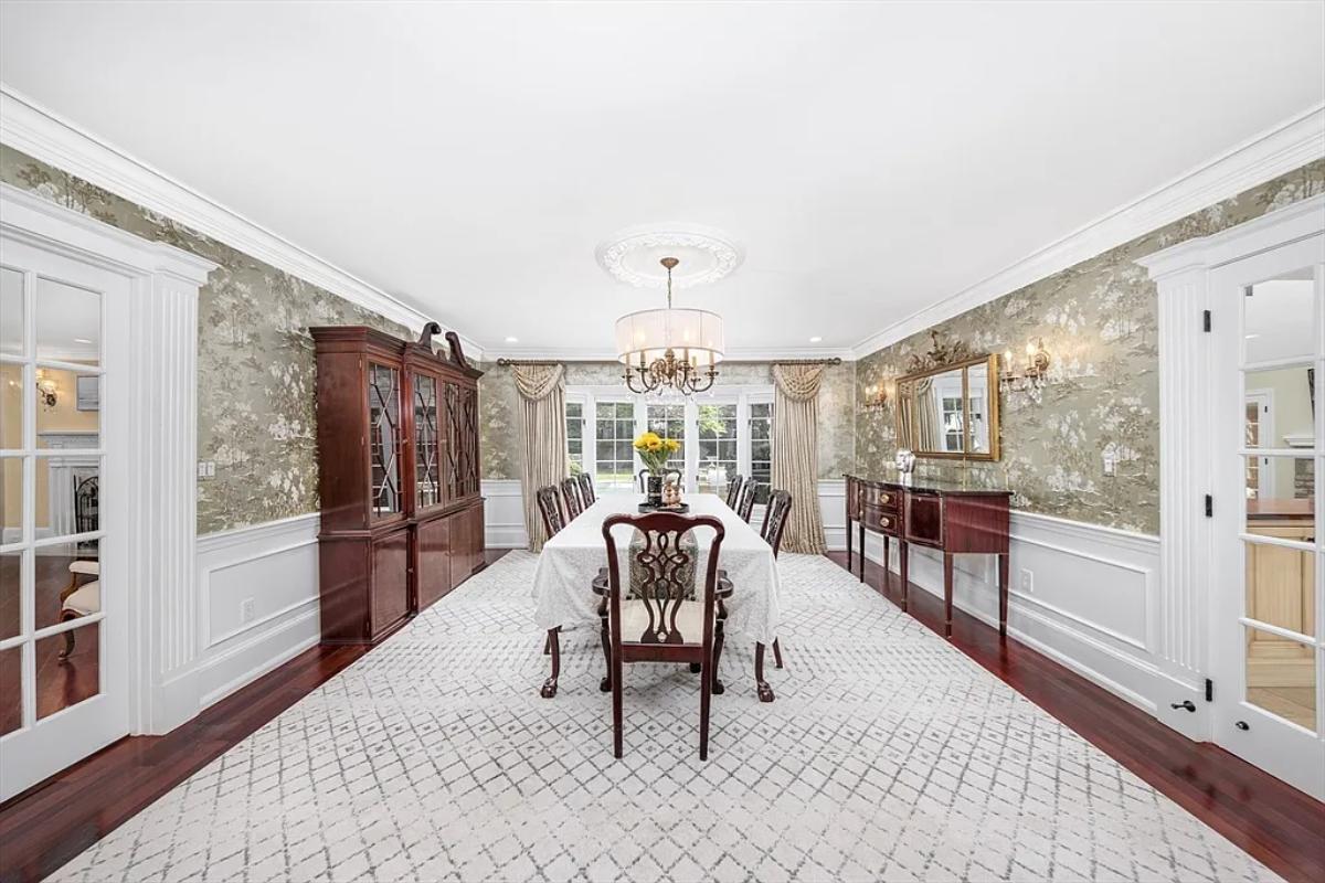 Dining room with a chandelier.