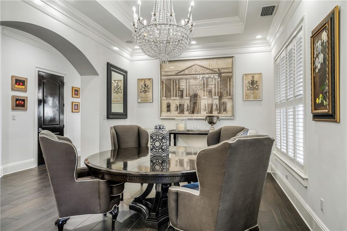 Dining room with a chandelier.