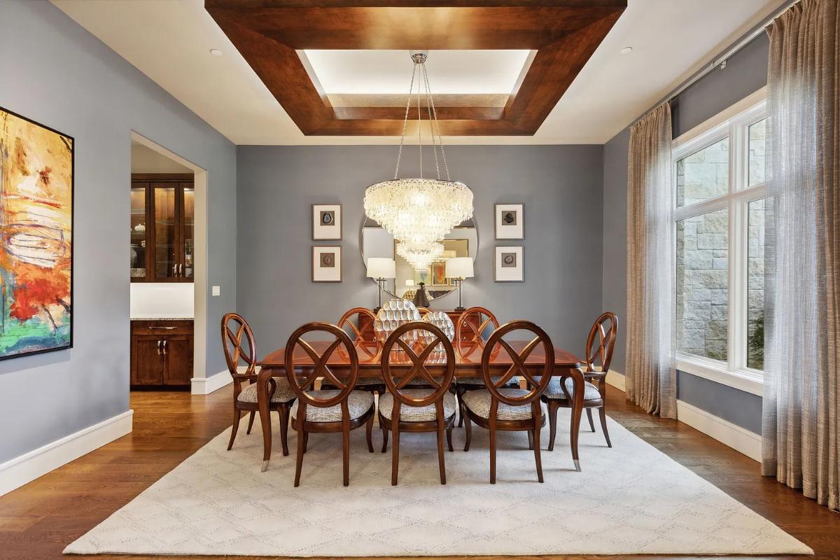 Dining room with a chandelier.