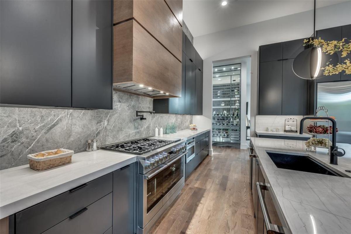 Kitchen with stainless-steel appliances and a center island prep area.