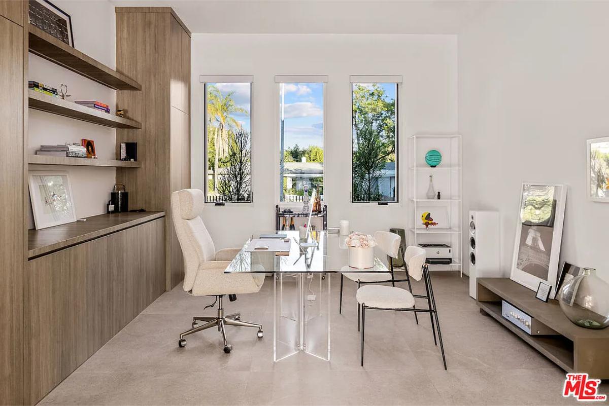Home office with a glass desk.