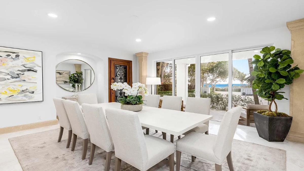 Dining room with a large table.