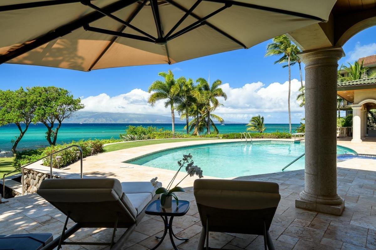 Pool with lounge chairs.
