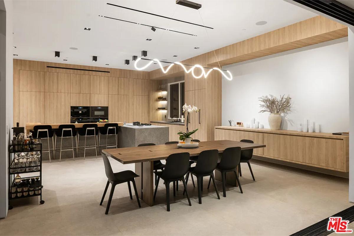 Dining room with a large wood table.