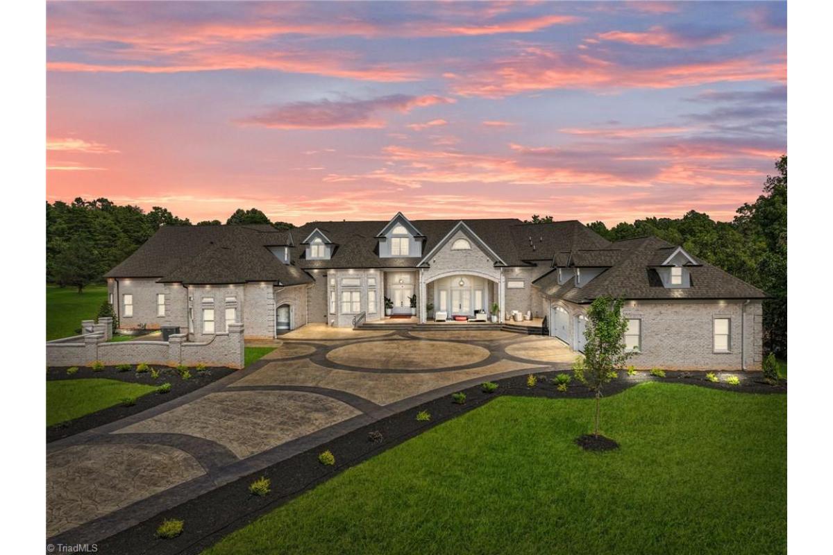 5-Bedroom Mansion with Theater Room and Gated Driveways 