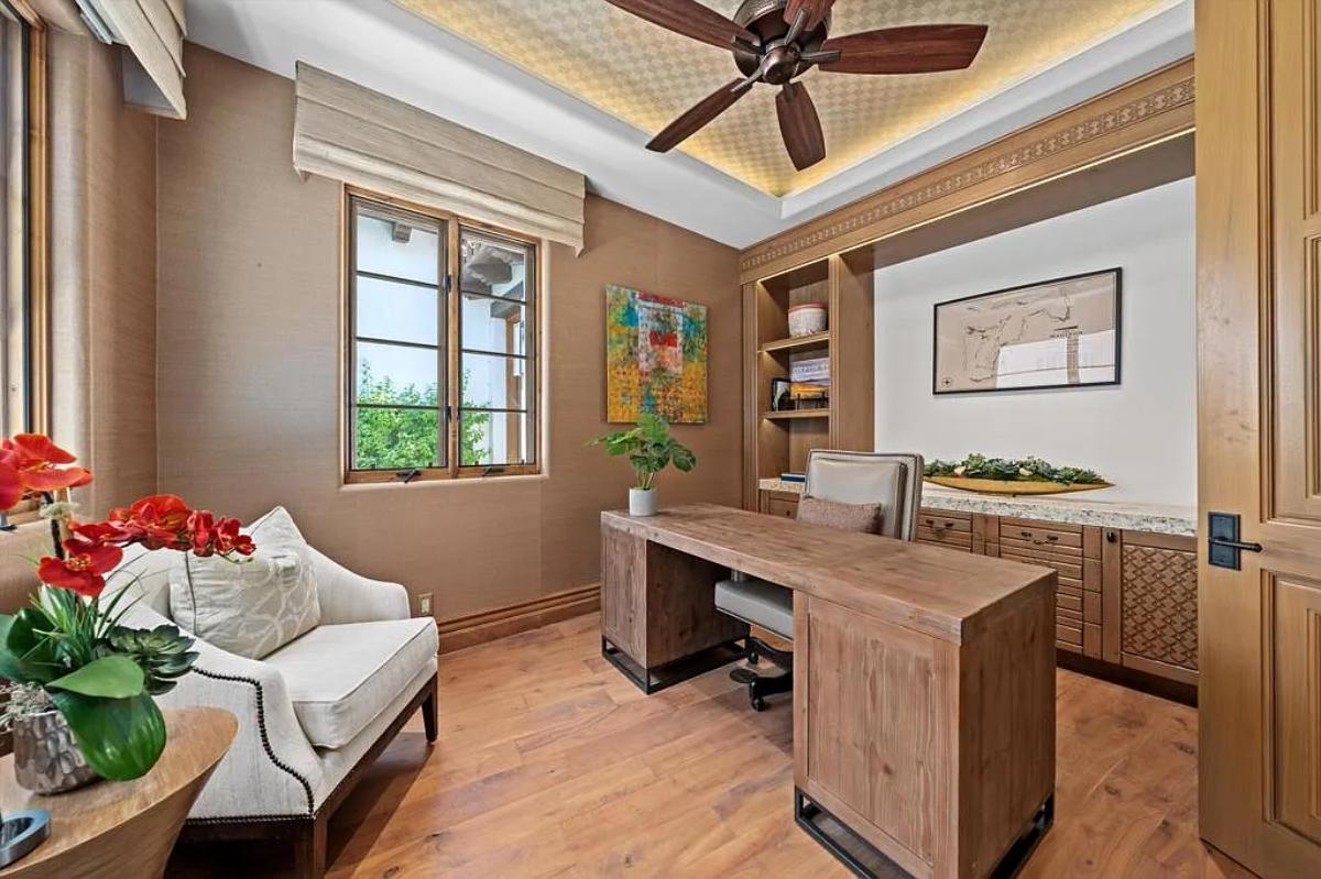 Home office with a hardwood desk.