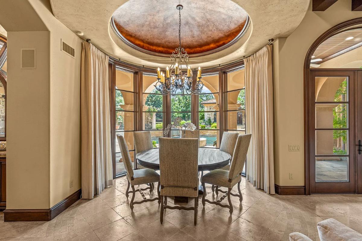 Breakfast nook with a chandelier.