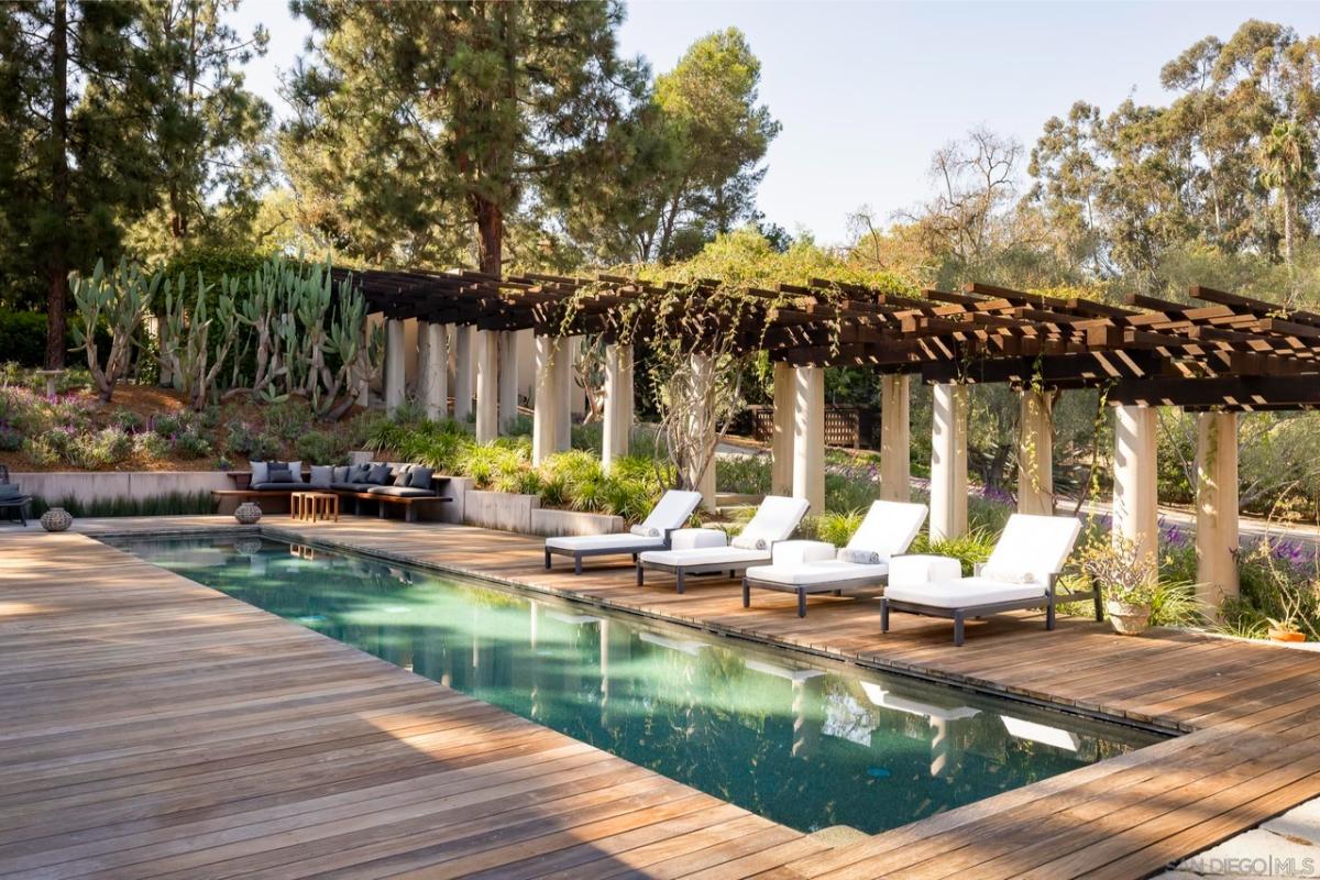 Pool with lounge chairs.