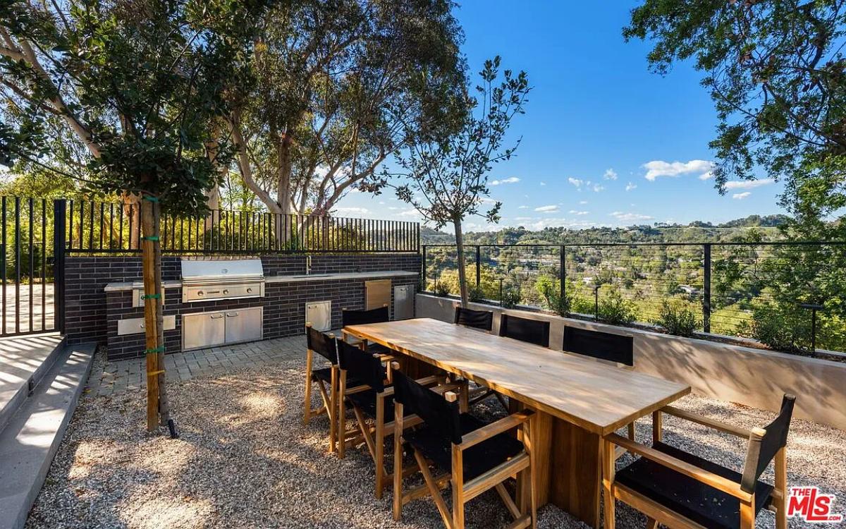 Outdoor dining area with mountain views.