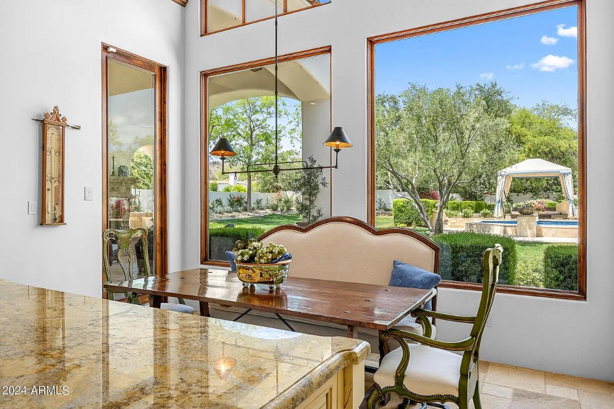 Breakfast nook with a wood table.