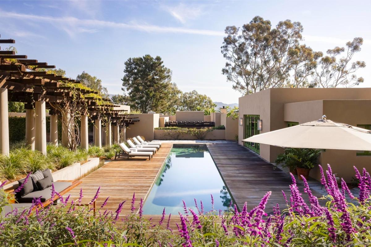 Pool with lounge chairs.