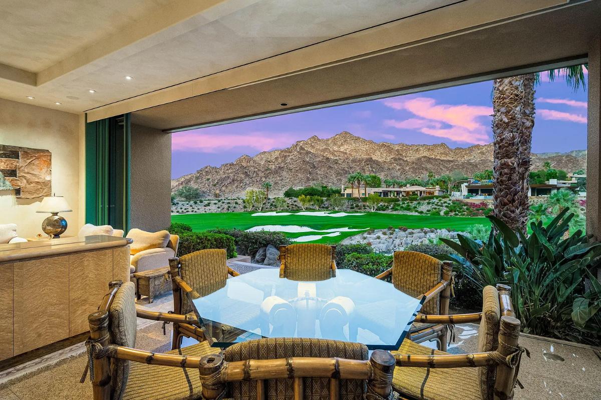 Breakfast nook with golf course and mountain views.