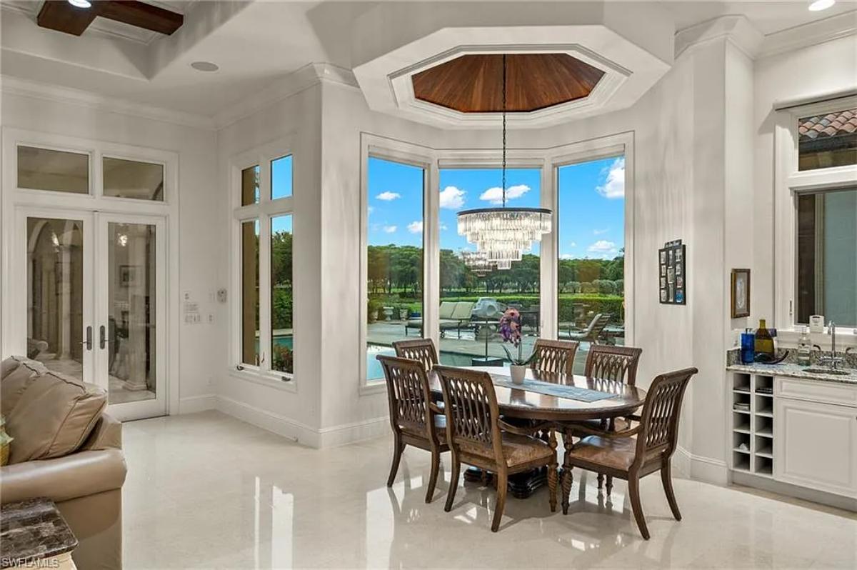 Dining room with a chandelier.