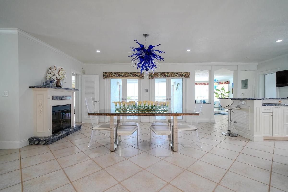 Dining room with a fireplace.