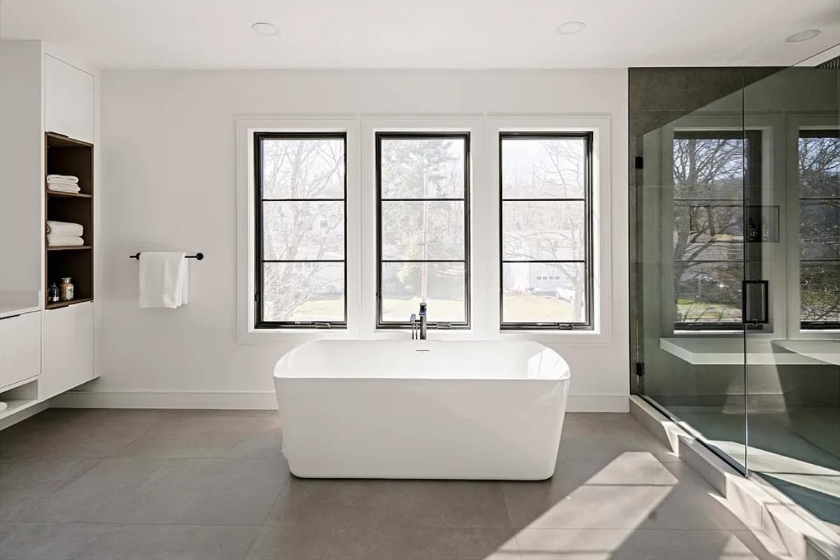 Bathroom with a soaking tub and a walk-in shower.