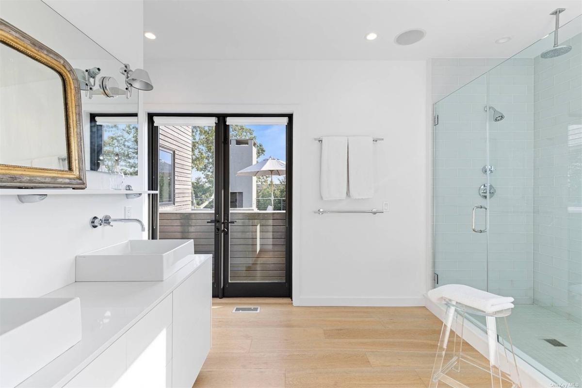 Bathroom with a sink and a walk-in shower.