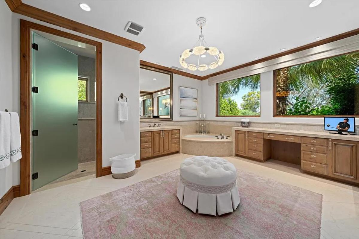 Bathroom with a soaking tub and a walk-in shower.