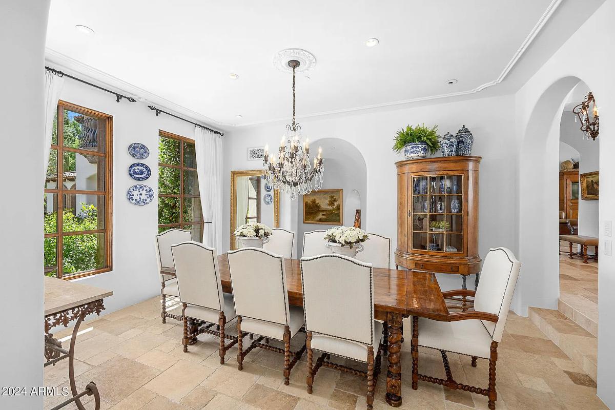 Dining room with a chandelier.