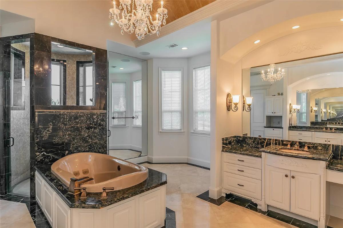 Bathroom with a soaking tub and a walk-in shower.