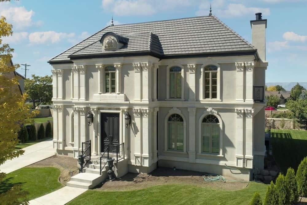Classic Mansion Facade with Intricate Stone Detailing