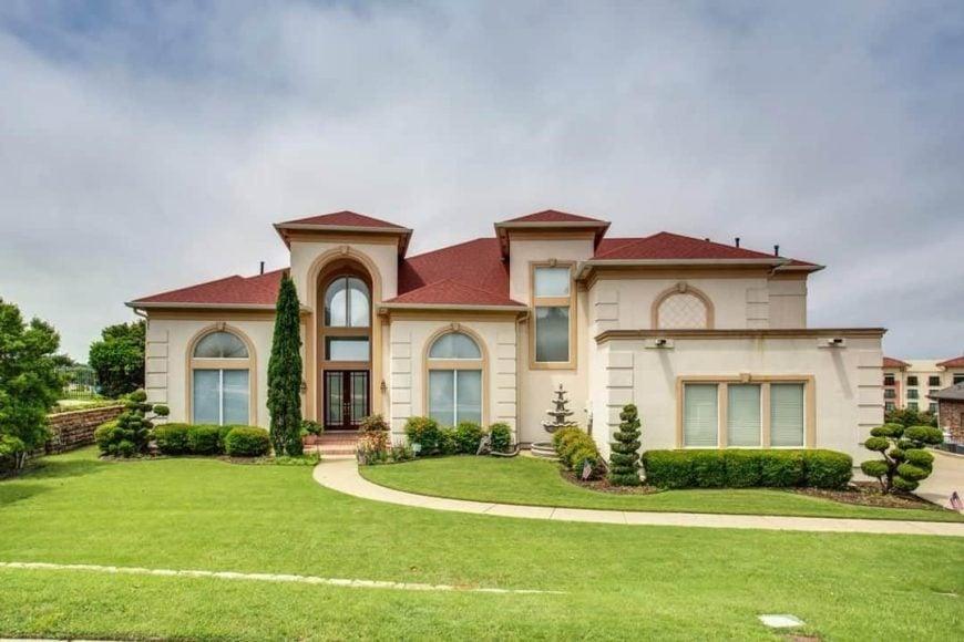 Grand Facade with Distinctive Red Roof and Symmetrical Design