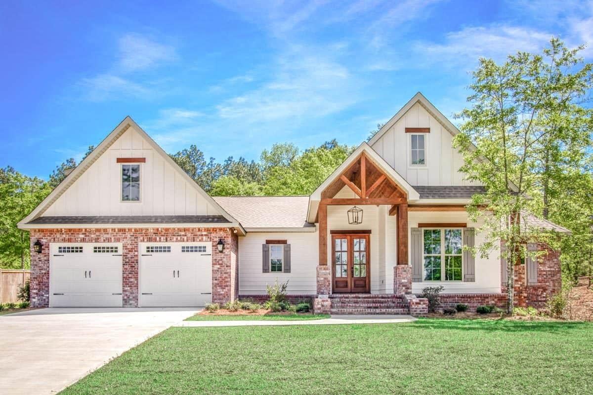 Charming Facade with Brick Accents and A-Frame Gables