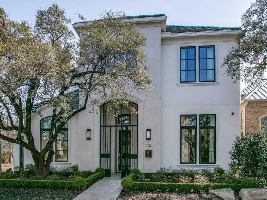 Notice the Elegant Arched Entryway Framing This Modern Facade