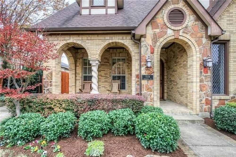 Tudor Revival Entryway with Twisted Column Detail
