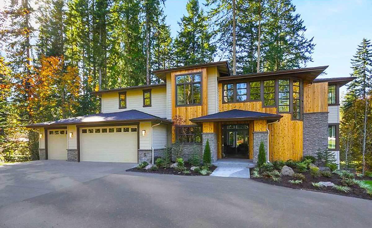 Modern Wood and Stone Fusion Amidst Nature