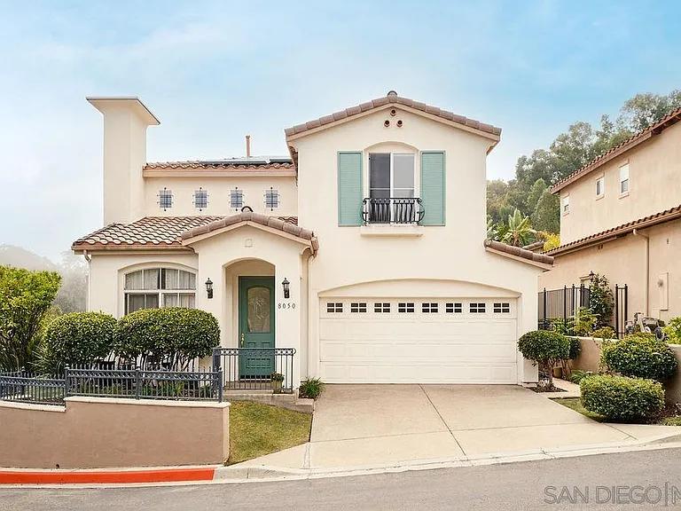 Charming Mediterranean Home with Elegant Arched Doorway