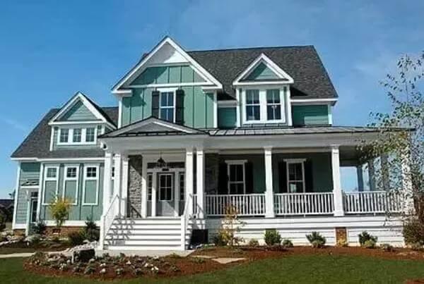 Classic Suburban Home with a Charming Wraparound Porch
