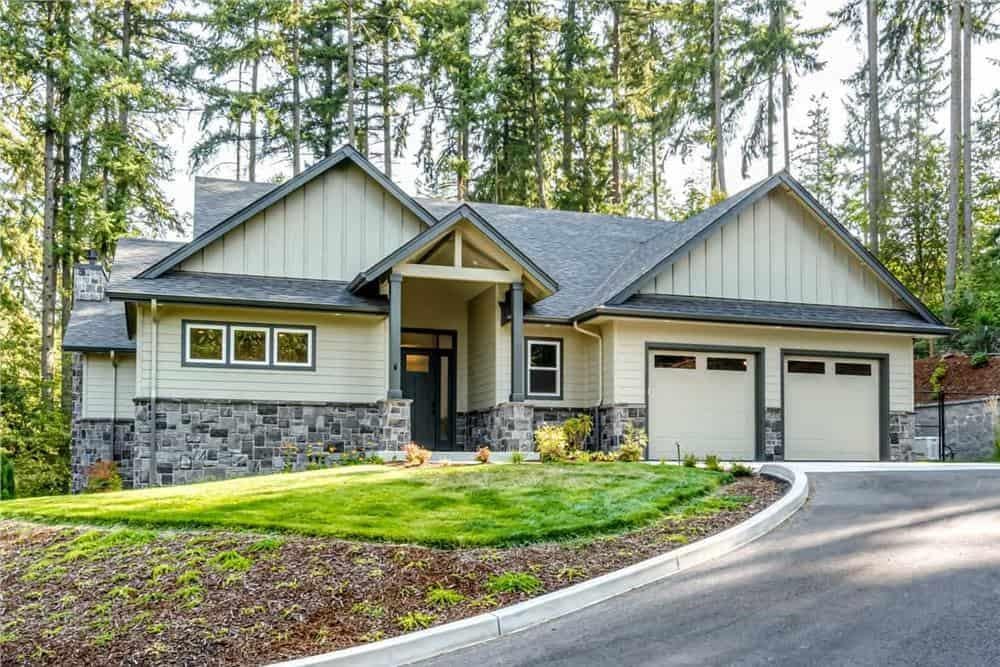Charming Suburban Home with Stone Accents in a Forest Setting