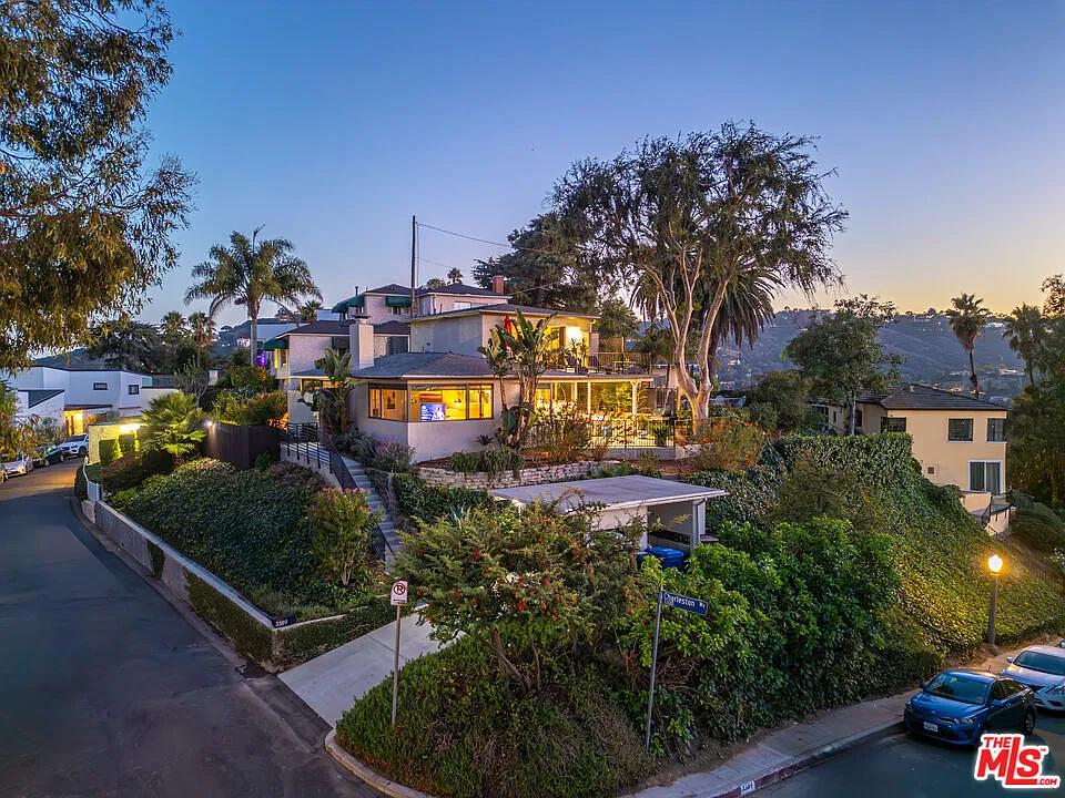 Charming Hillside Home with Expansive Views