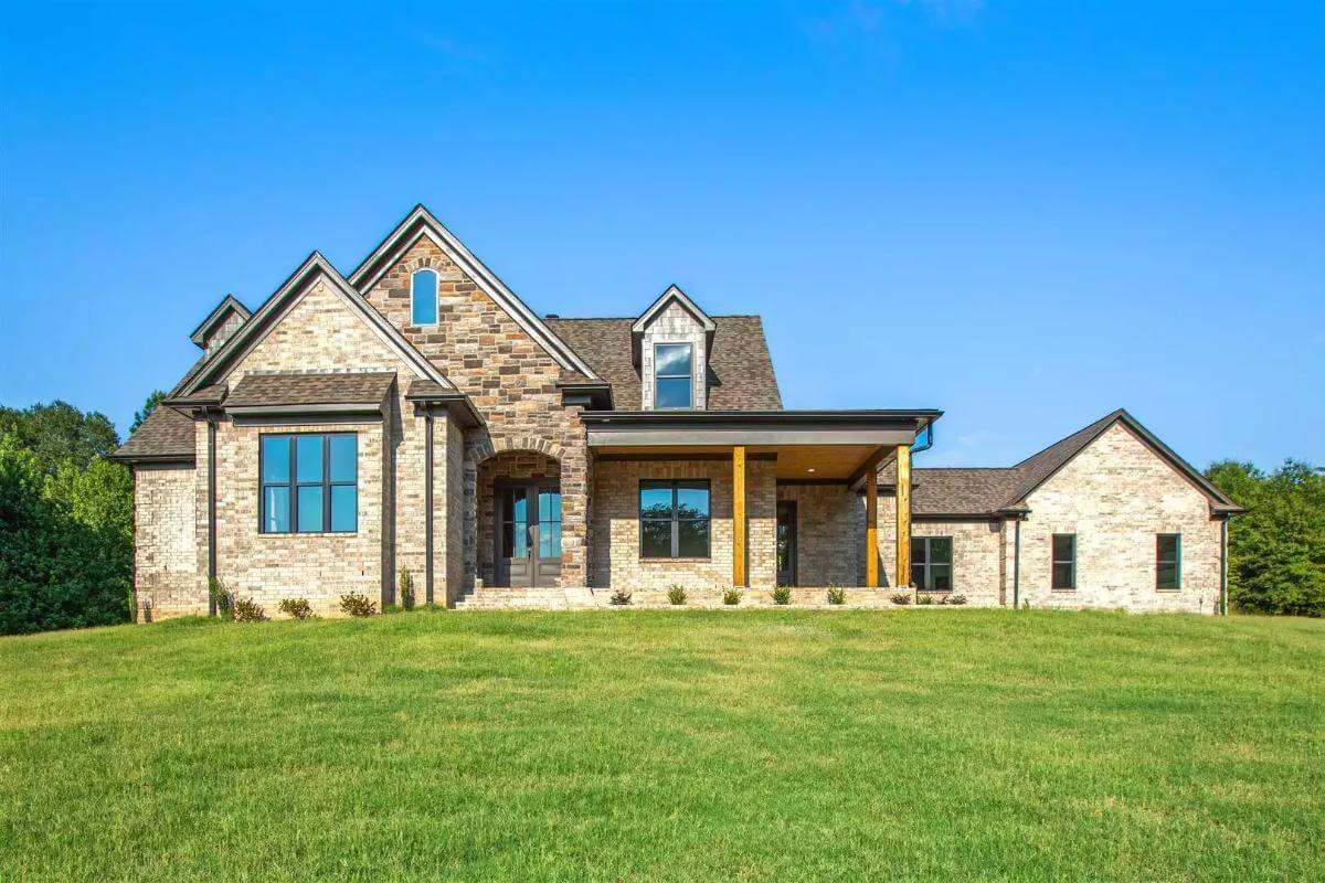 Classic Brick Home with a Modern Twist and Inviting Porch