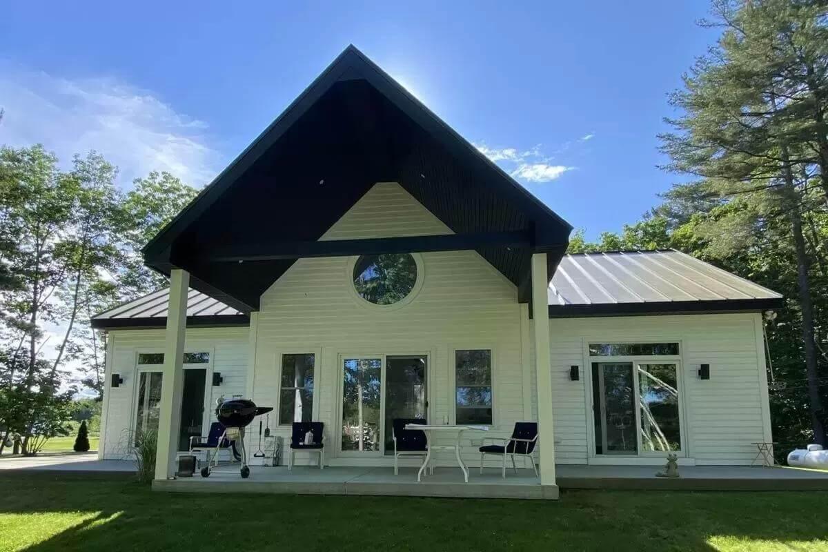 Charming A-Frame Porch with Circular Window Feature