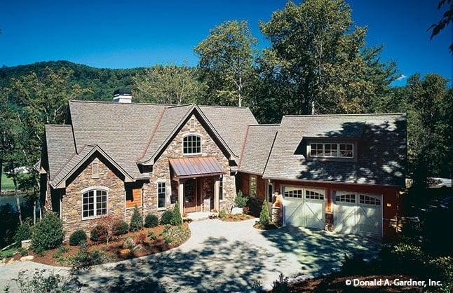 Charming Stone Facade with Dormer Windows in a Woodland Setting