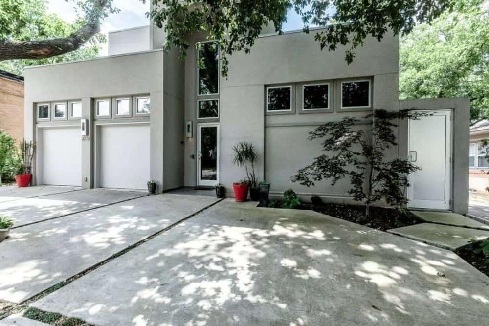 Modern Facade with Clean Lines and Twin Garages