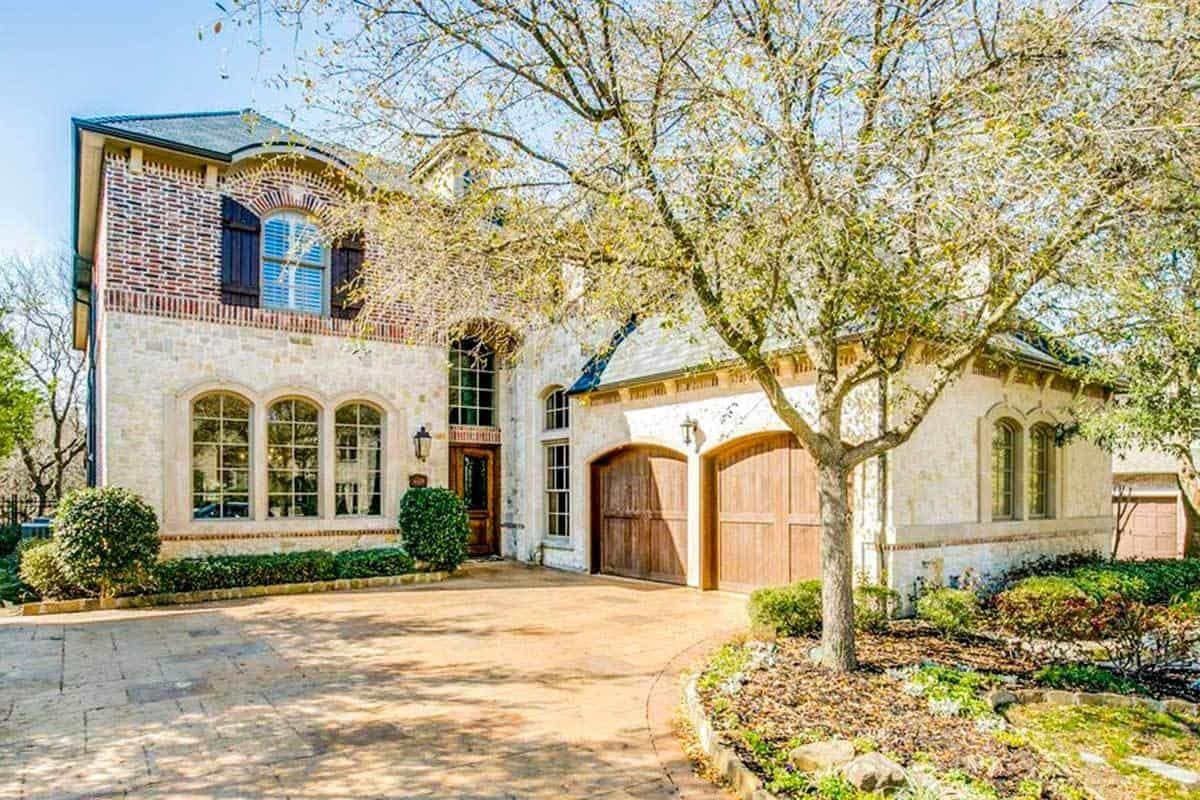 Check Out the Classic Brick and Stone Facade of This Elegant Home