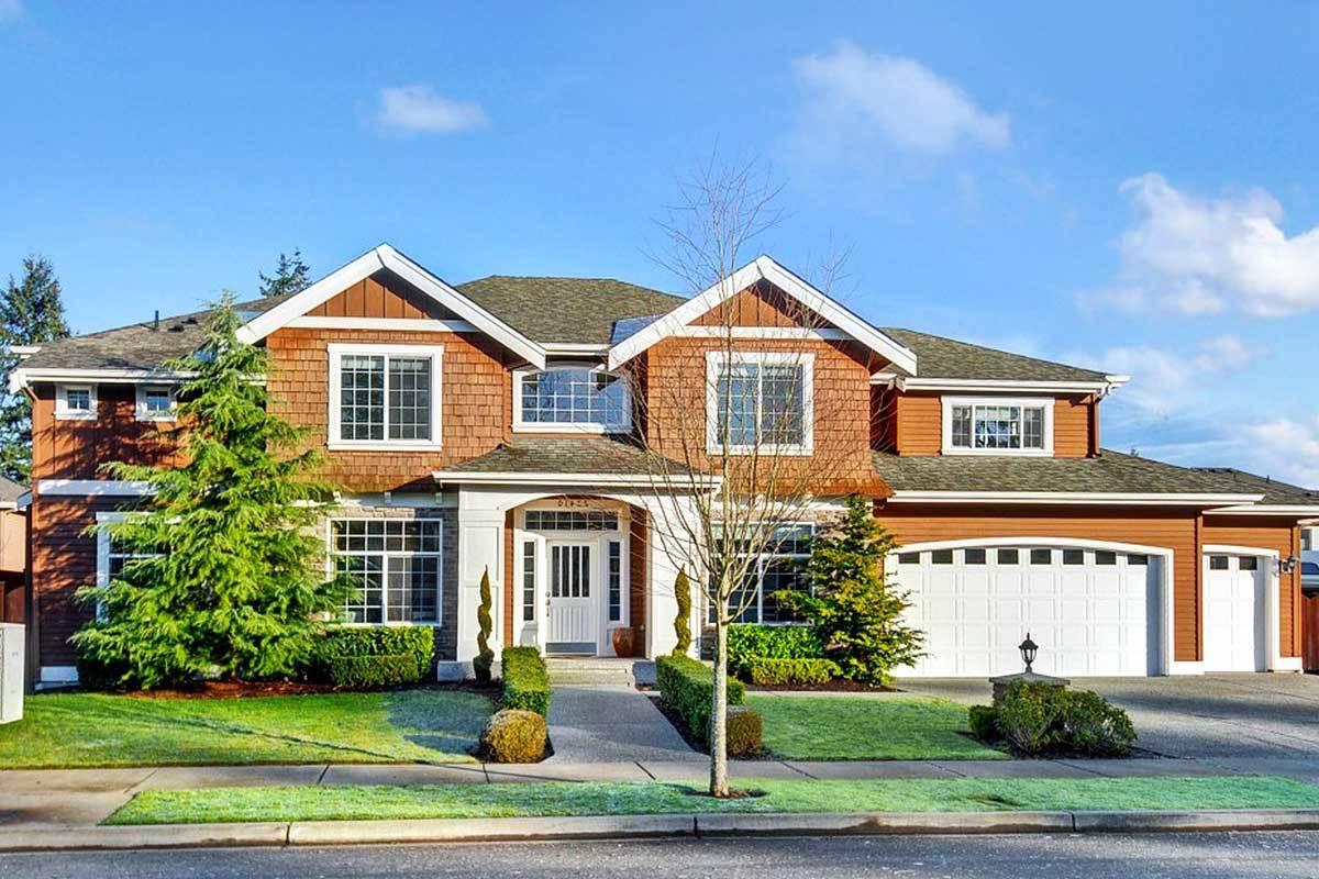 Classic Suburban Home with Distinctive Cedar Shingle Facade
