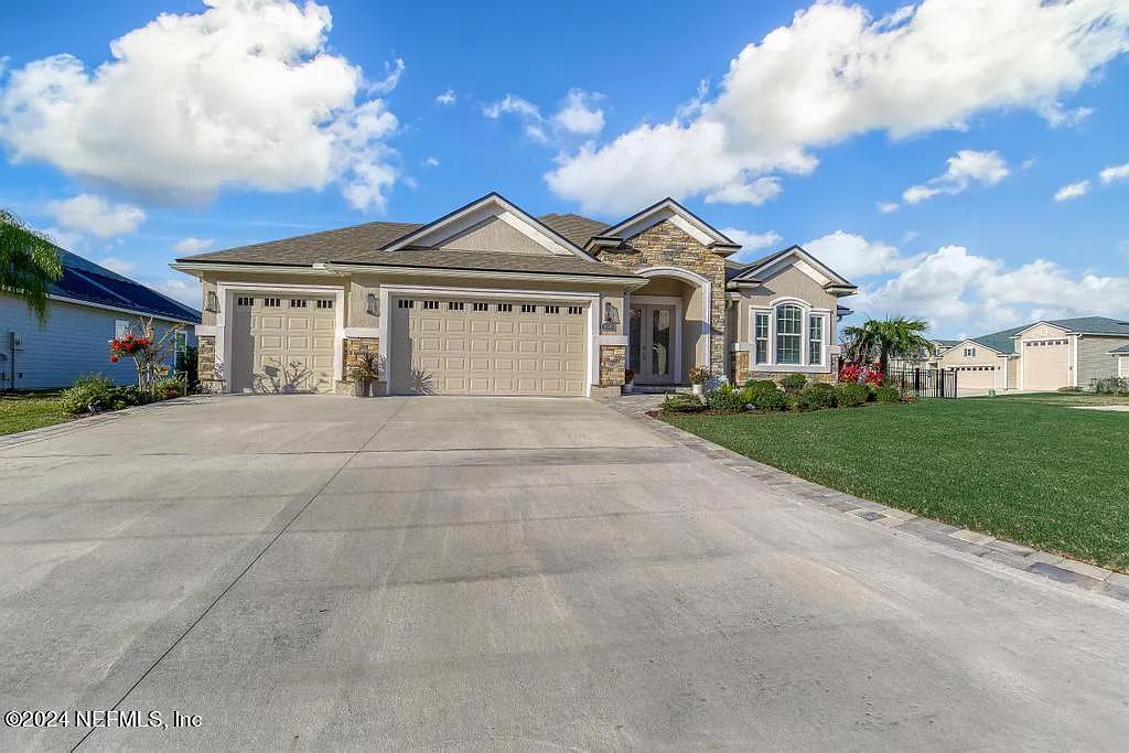 Check Out the Stone Accents on This Elegant Suburban Home