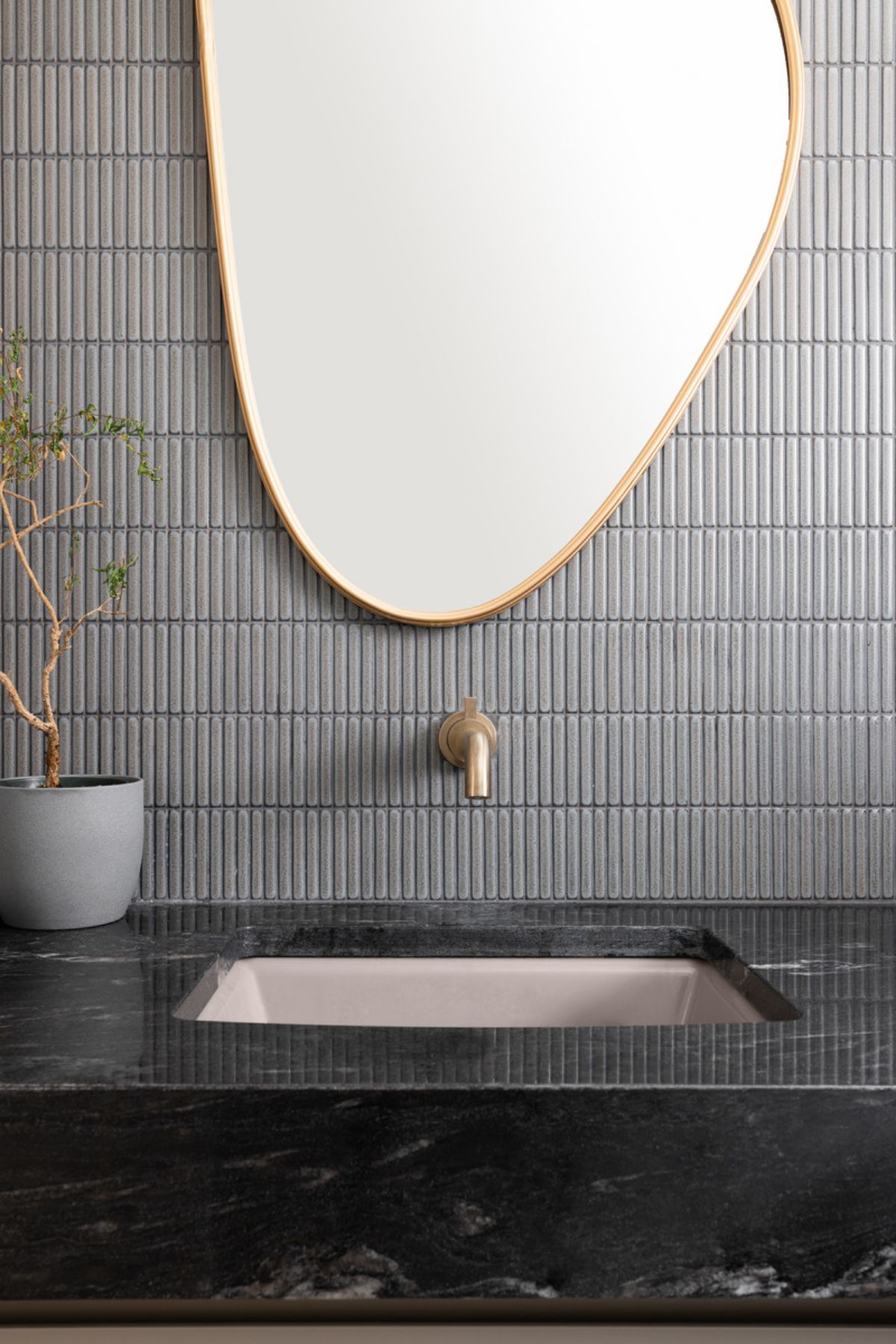 Marble sink with faucet and mirror