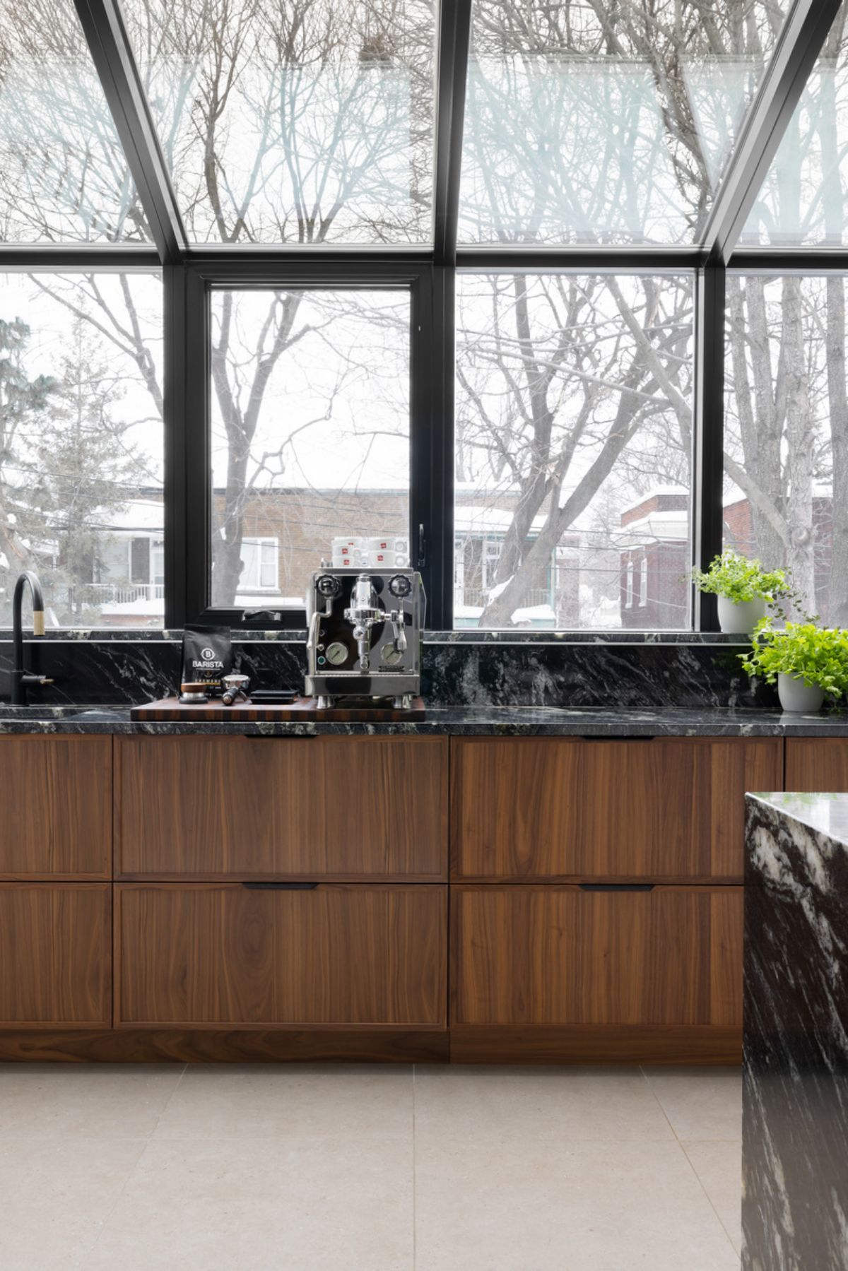 Granite counter top with drawers and wooden cabinet beneath