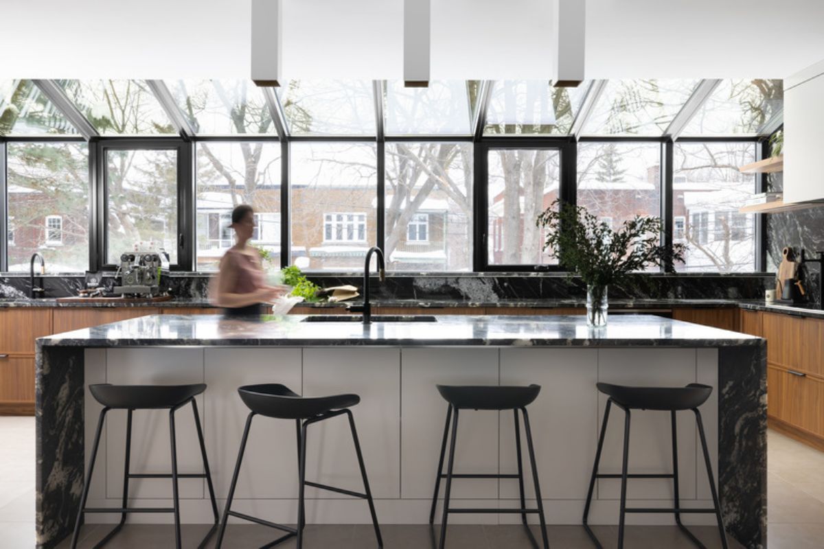 Kitchen with kitchen island and chairs