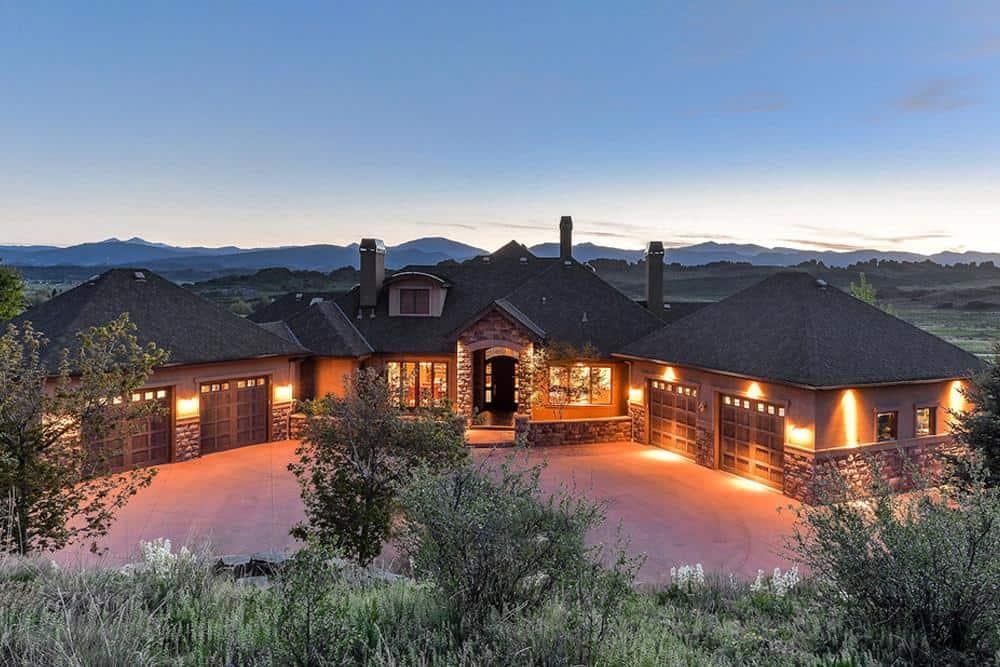 Mountain Manor with Distinctive Stone Facade and Triple Garages