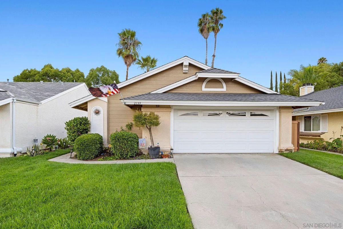 Classic Suburban Home with a Touch of Palm Trees